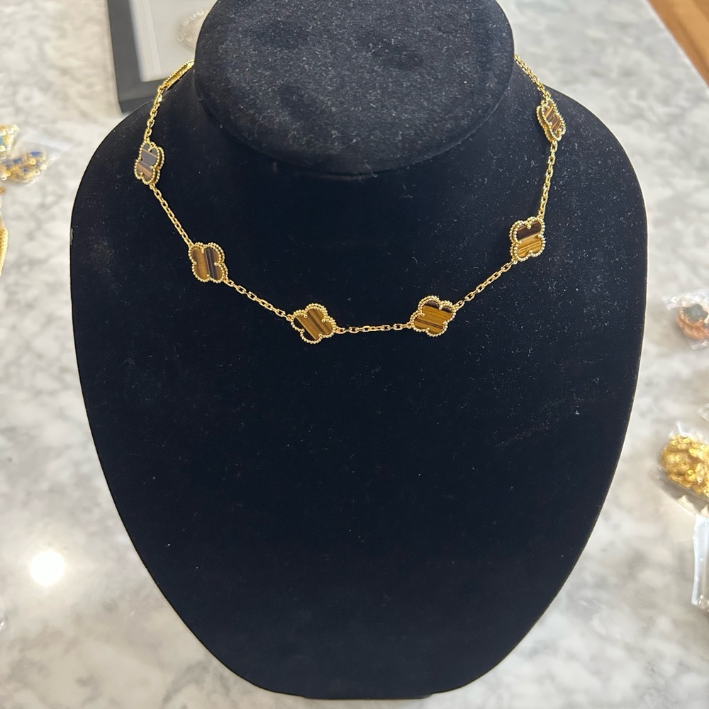 Tiger eye and yellow gold 10 motif necklace